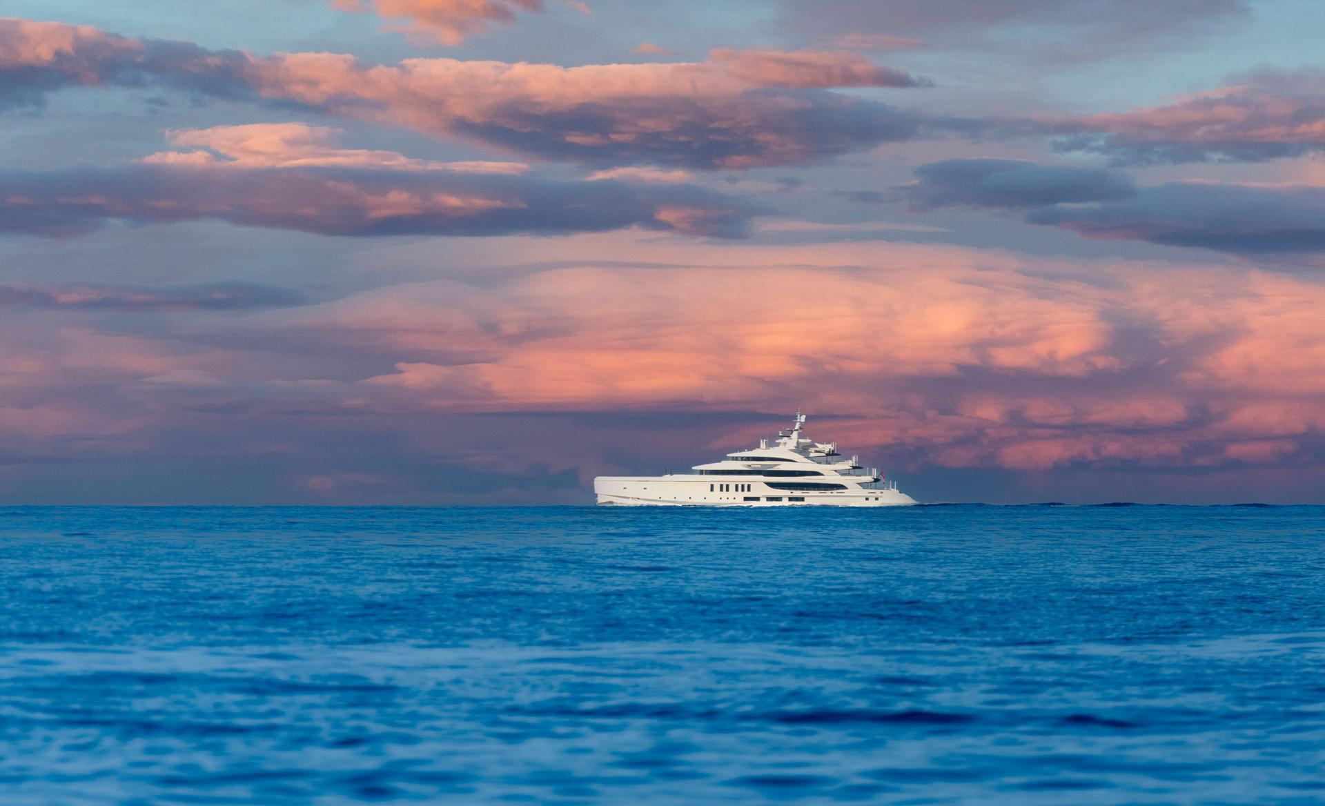 A luxurious yacht sails across the calm ocean under a stunning, colorful sunset sky, capturing a moment of tranquility and elegance.