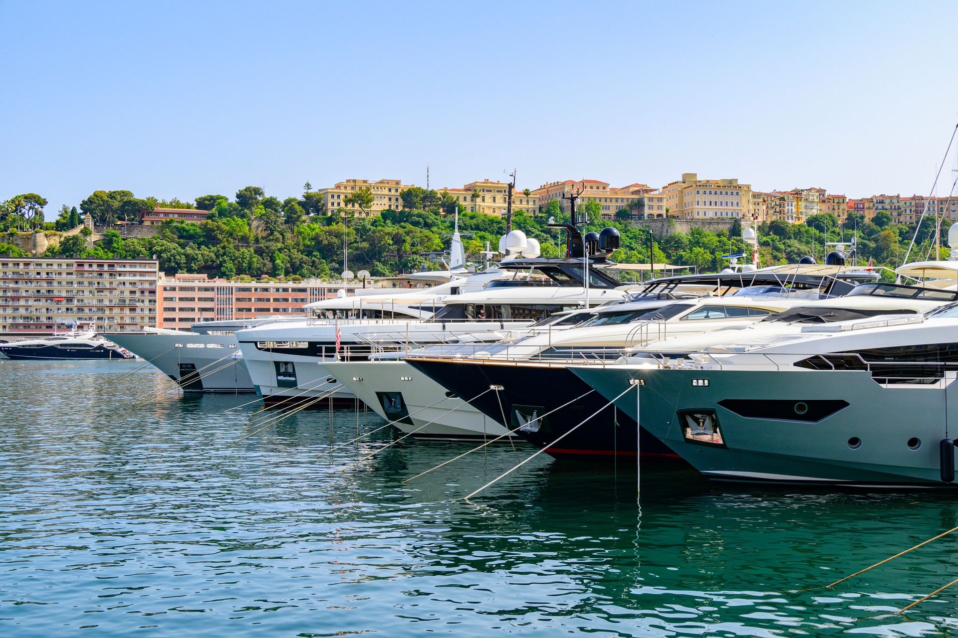 Superyachts in the Monaco harbour during summer